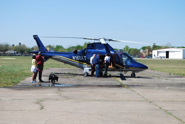 SABCA A-109 (N168KT) - Potential customers looking at the new Agusta at Tri-Star Aviation