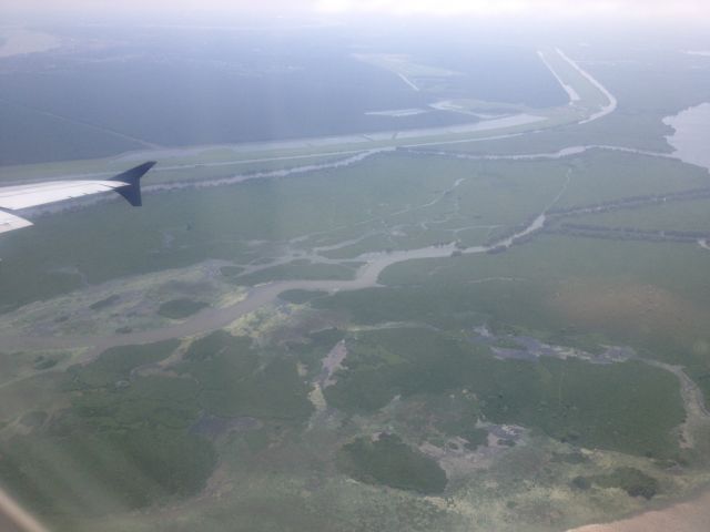 Airbus A319 (N827AW) - Rivers over Louisiana. Taken from a US Airways Airbus a319 N827AW enroute from Charlotte Douglas International Airport (KCLT) to New Orleans International Airport (KMSY) on July 16, 2014.