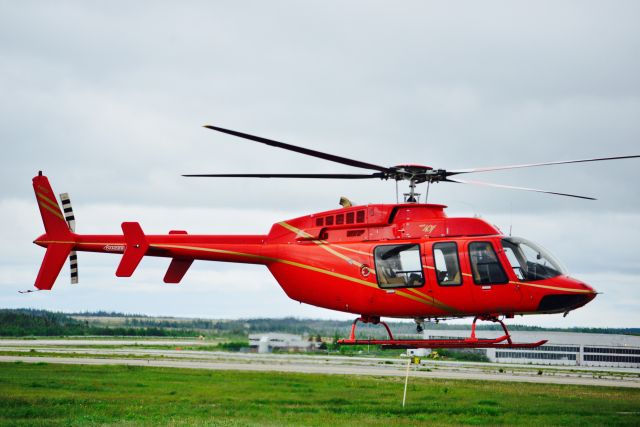 Bell 407 (C-GEPA) - Leaving ramp at Universal Helicopters at Gander, Canada. It is based out of Goose Bay, Labrador.