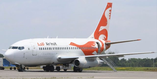 C-GMAI — - Port view of a 45-year old Boeing 737-200 (C-GMAI) in the striking livery of Air Inuit at YOW on 4 Jul 23.  Aircraft was chartered from YKL.   br /br /Air Inuit was founded by the Inuit of Nunavik (Northern Québec) in 1978 with a single de Haviland Beaver.br /br /This aircraft was first delivered to Air Gabon in 1978 and served with African carriers until it was acquired by Air Inuit in 2010 and modified for northern operations including flights from gravel runways.  Note the addition of the “gravel kit” a ski-like deflector mounted to the nose wheel, and vortex dissipators extending in front of each engine.br /br /On 3 Jul 23, Air Inuit announced the acquisition of three 737-800 combis to eventually replace the five -200s flying with the airline.