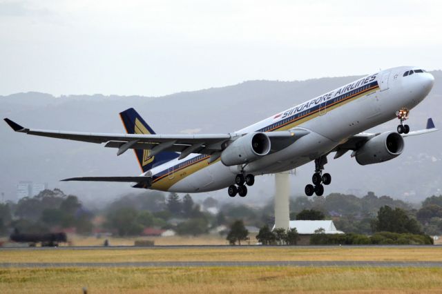 Airbus A330-300 (9V-STA) - Getting airborne off runway 23 and heading home to Singapore. Saturday 1st December 2012.