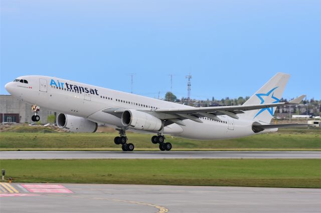 Airbus A330-200 (C-GJDA) - Air Transat Airbus A330-243 departing YYC on May 24.