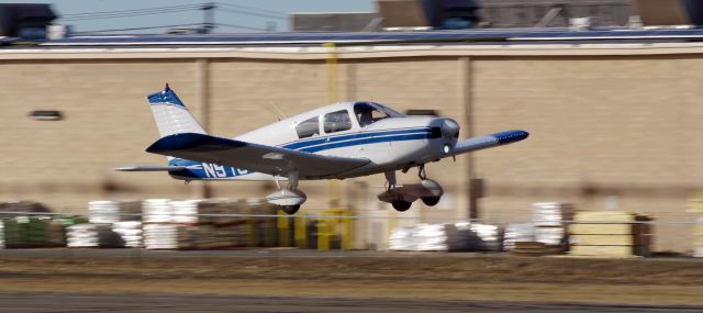 Piper Cherokee (N9737W) - LINDEN AIRPORT-LINDEN, NEW JERSEY, USA-JANUARY 21, 2022: Seen at the airport taking off on Runway 09.