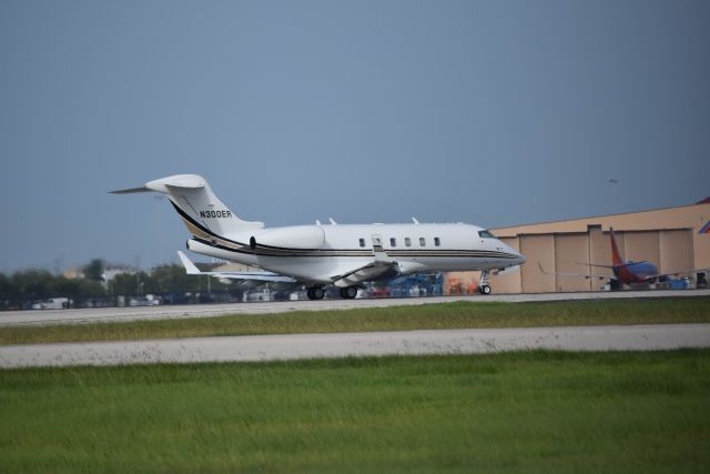 Bombardier Challenger 300 (N300ER) - 8/7/2016: A Challenger 300 landing on 12R at KHOU.