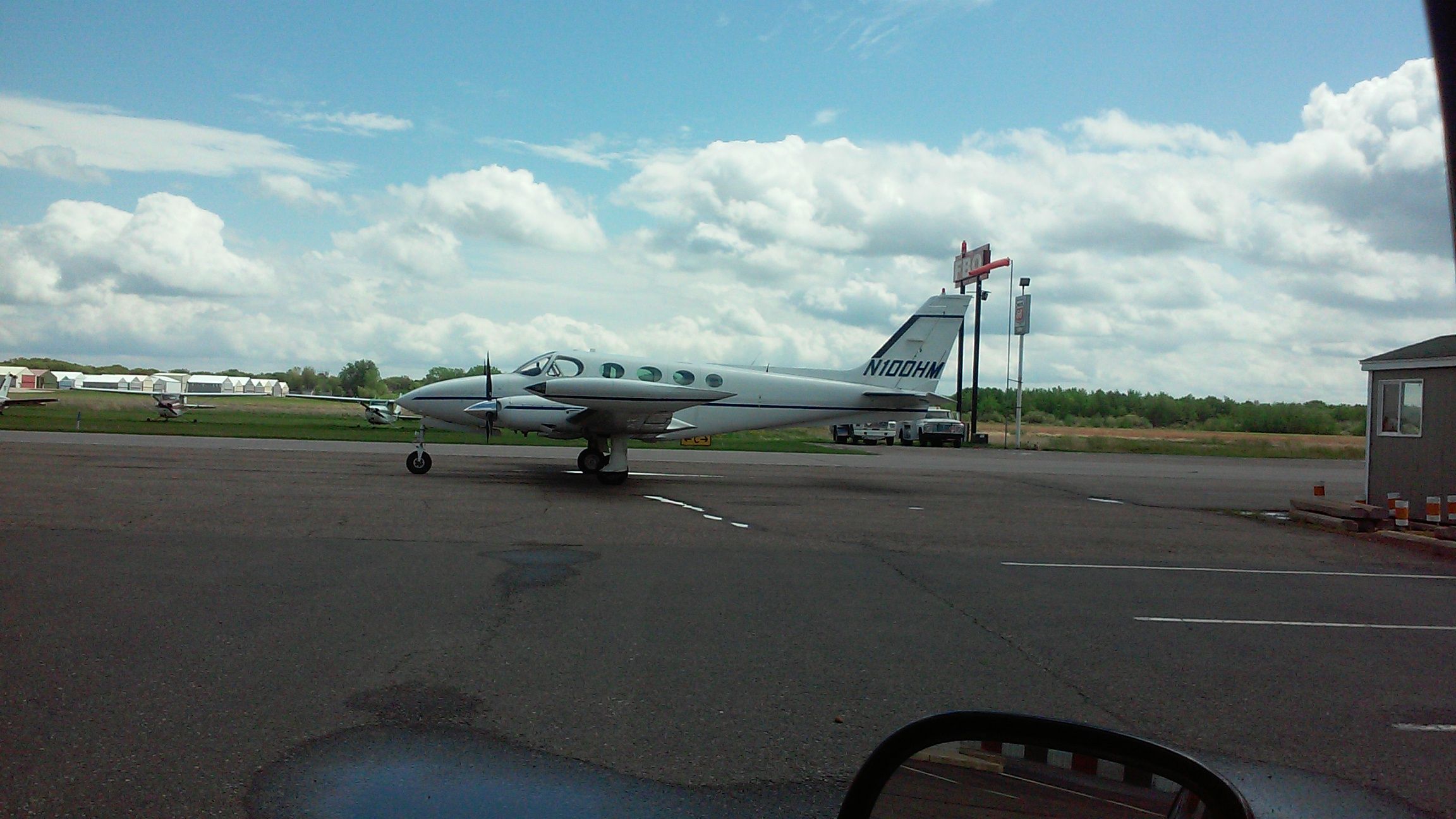 Cessna 340 (N100HM) - Cessna 340A waiting at Cirrus FBO to fly to KSTC