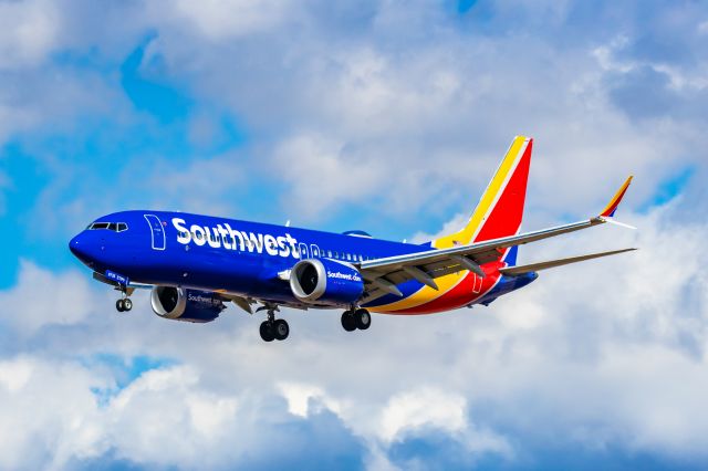 Boeing 737 MAX 8 (N8735L) - A Southwest Airlines 737 MAX 8 landing at PHX on 2/28/23. Taken with a Canon R7 and Canon EF 100-400 L ii.