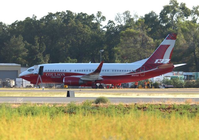 BOEING 737-300 (N137CG) - KRDD - super rare shot for me at Redding this jet was here for less than an hour on 8/8/2019 - I was able to leave work on OT 1-hr earlier and just happened to cruise the backside of the runways. T-137 departed for the Tucker Fire in Modoc County, and then returned to McClellan Field in Sacramento for the night. A tip on FB said this is the 1st time this jet was ever at Redding Municipal. Of Course I shot about 120 pics including departure.