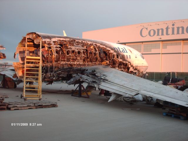 Boeing 737-700 (N18611) - The Continental flight that never left Denver. Flight 1404, they put the remains on the Continental hangar ramp for the investigation.