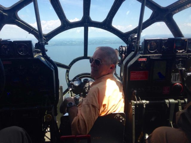 Boeing B-29 Superfortress (N529B) - My husband Vern sitting in FiFis bombardier seat while moving it from EAA Air Venture  display to Appleton WI airport she will give rides for some lucky attendees.