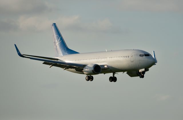 BOEING 737-300 (N625SW) - Swift Air arrives into Houston Hobby from El Paso at golden hour.  Taken from the balcony of the 1940 Air Terminal Museum