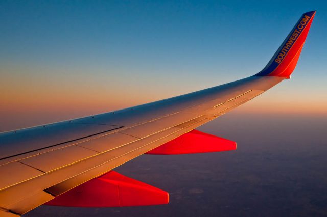 Boeing 737-700 — - Image taken shortly after take-off and as the sun was rising over Texas.