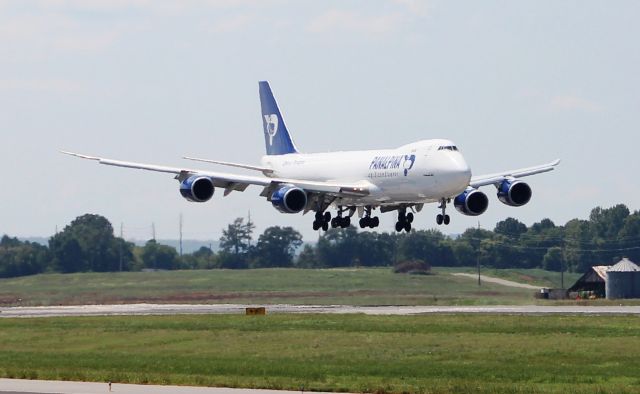 BOEING 747-8 (N850GT) - A Boeing 747-8F in Panalpina livery about to touchdown on Runway 36L in the Noonday sun at Huntsville International, AL - September 2, 2016.br /Shot with a Canon T5, using the 75mm-300mm lens from just outside the taxiway fence along the west side Boeing road.