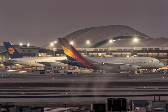 Airbus A380-800 (HL7635) - 10th November, 2024: Waiting at the gate at LAX's Tom Bradley International Terminal for departure to Seoul as flight OZ 203. Parked next to her is Lufthansa A380 wating to leave for Munich as LH 453. 