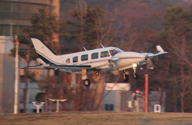 Piper Navajo (N5CQ) - Taking off of 20L at PDK on 02/16/2011