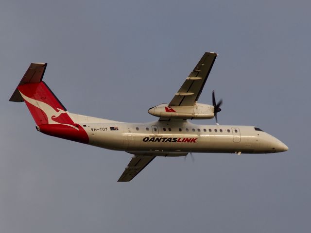 de Havilland Dash 8-300 (VH-TQY) - Lifting off on a dull, grey sunset from runway 23, Adelaide International. Photo taken from the Tapleys Hill Road viewing area.