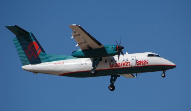 N989HA — - America West Express landing at Yuma International back in 2006.  Aircraft now owned by Wells Fargo Bank.