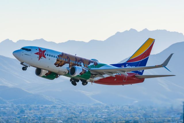 Boeing 737-700 (N943WN) - A Southwest Airlines 737-700 in California One special livery taking off from PHX on 2/12/23 during the Super Bowl rush. Taken with a Canon R7 and Canon EF 100-400 II L lens.