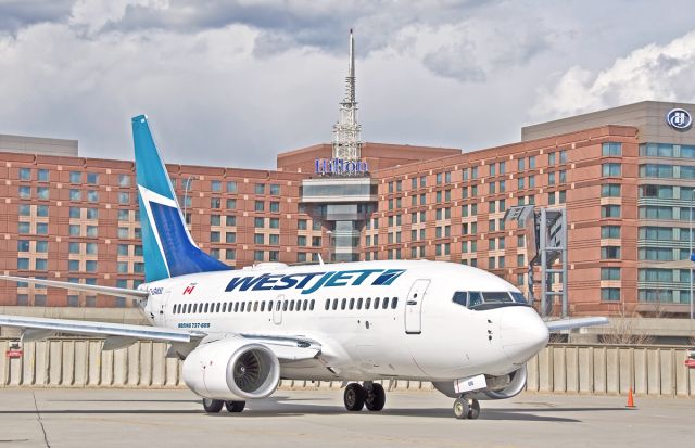 BOEING 737-600 (C-GWSL) - Logan Airport Hilton and WestJet @ KBOS Logan !