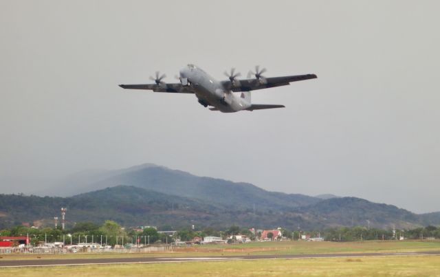 Lockheed C-130 Hercules — - On the ramp getting fuel on our way to Sao Paulo, rain was in the distance as this aircraft departed on a hot, humid day in Panama