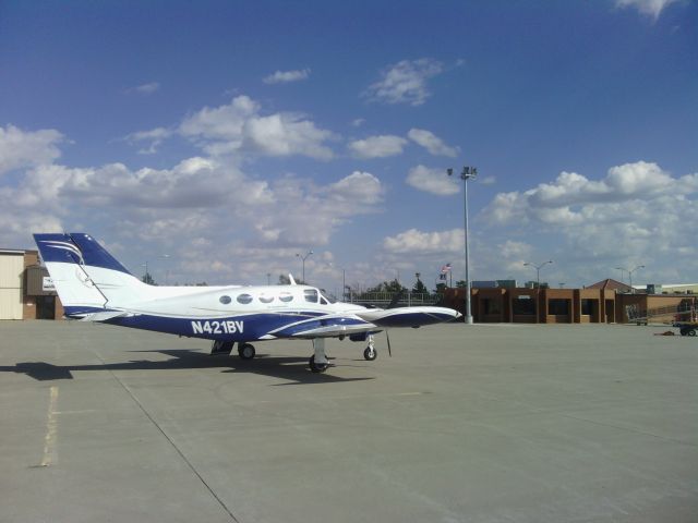 Cessna 421 (N421BV) - Cessna 421 N421BV parked outside Napolis Restaurant, Garden City, KS