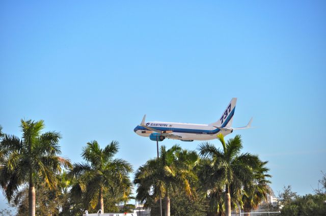 Boeing 737-800 (N276EA) - Low flying on arrival in Miami Fl for the first of B737s for the new Eastern.