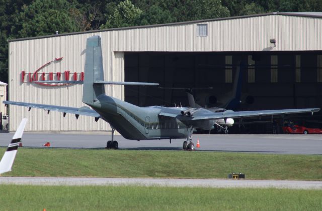 De Havilland Canada DHC-4 Caribou (N238PT) - I was stunned to see a vintage plane like this at Marietta! Seems like it has been through some weathering. Photo taken on 9/11/2020.