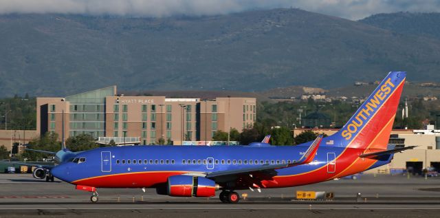 Boeing 737-700 (N467WN) - Slowing down to jogging speed after landing on RTIAs runway 16R to complete an early morning hop from KLAS.  