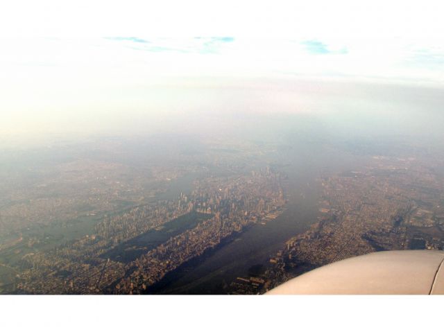 Beechcraft Baron (58) (N8111M) - Over Manhattan.