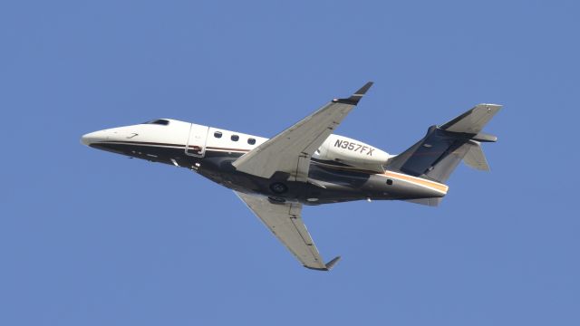 Embraer Phenom 300 (N357FX) - Departing LAX on 25L