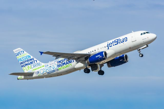 Airbus A320 (N598JB) - A JetBlue A320 in Bluemanity special livery taking off from PHX on 2/11/23 during the Super Bowl rush. Taken with a Canon R7 and Canon EF 100-400 II L lens.