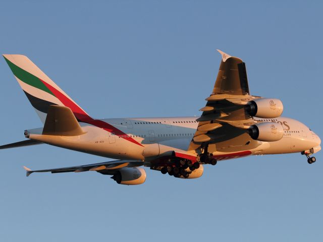 Airbus A380-800 — - The largely white livery of this Emirates A380-800, IMO certainly looks better with a sunset to add a bit of colour to it.