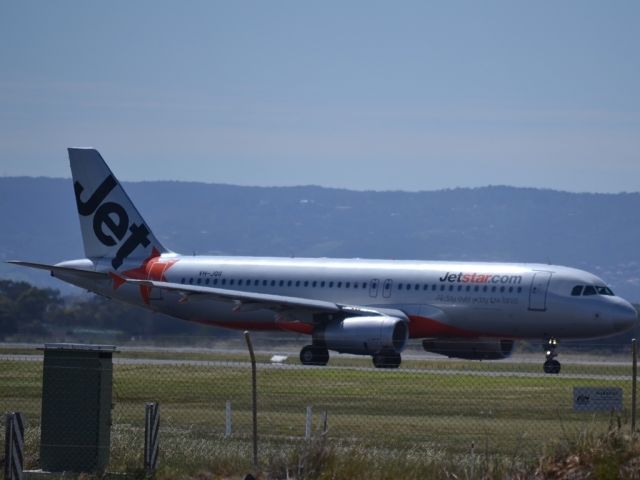 Airbus A320 (VH-JQG) - On taxi-way, heading for take off on runway 05.