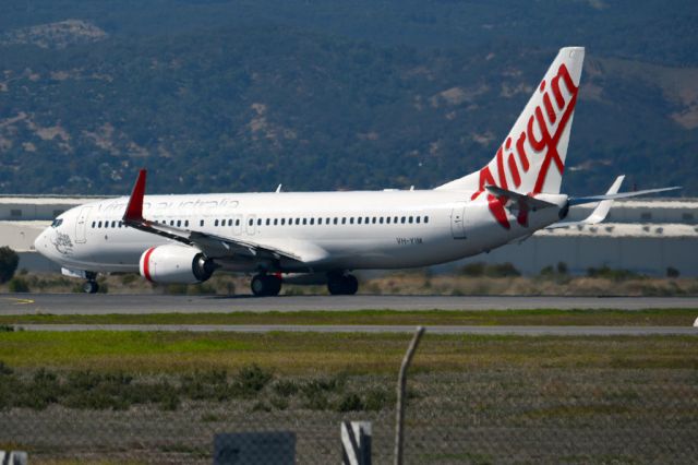 Boeing 737-800 (VH-YIM) - Rolling for take-off on runway 05. Monday, 14th April 2014.