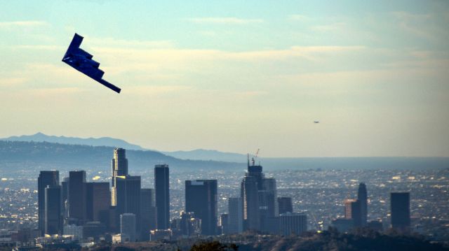 Northrop Spirit (82-1066) - B-2 Spirit of America flys past Downtown Los Angeles before flying over for the Rose Parade on a clear New Years Day 