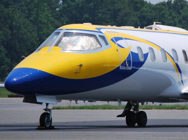 Learjet 60 (N929SR) - T & M AIR LLC - University of Michigan "Go Big Blue" at KJQF - 6/1/11