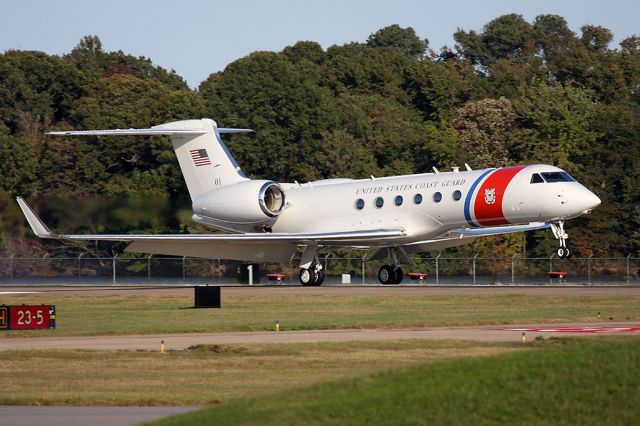 — — - "Coast Guard One-Zero-One" landing RWY 23.