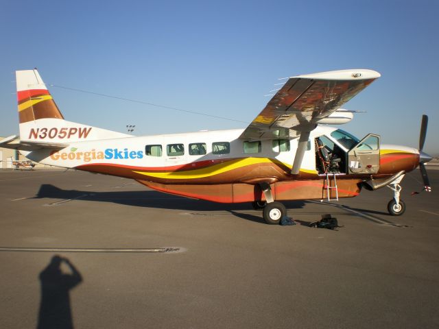 Cessna Caravan (N305PW) - N305PW on the ramp at North Las Vegas (KVGT) after arrival from Maui, Hawaii (PHOG) Delivered for Pacific Wings for use for new upstart Georgia Skies.