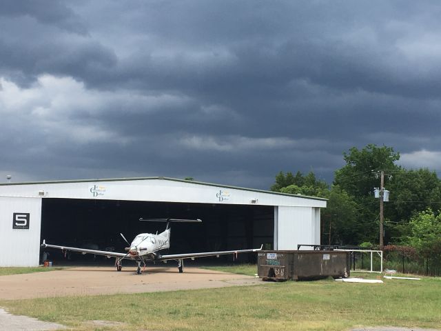 Pilatus PC-12 (N349WG) - Storm coming.