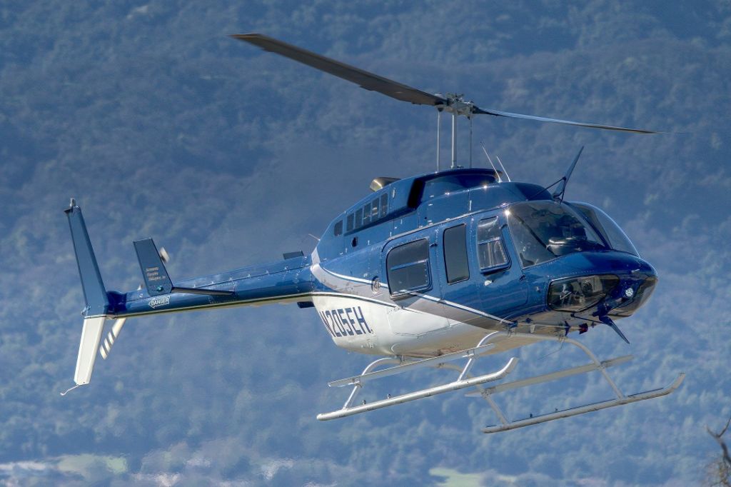 Bell JetRanger (N205EH) - Bell 206L-3 Long Ranger over Livermore Municipal Airport. February 2021