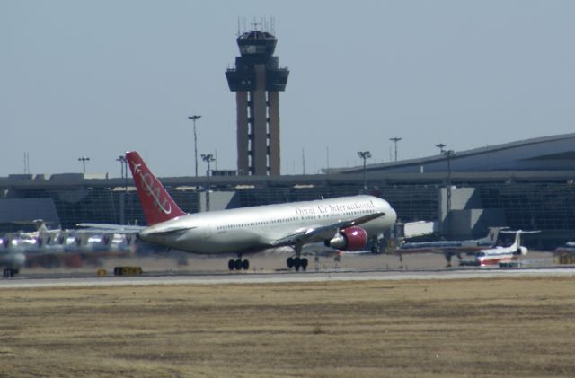 — — - Omni Air taking off from KDFW.