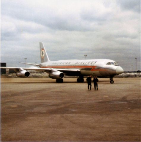 — — - A trip to ORD to watch airplanes. I was 17. The picture was taken with a Instamatic camera