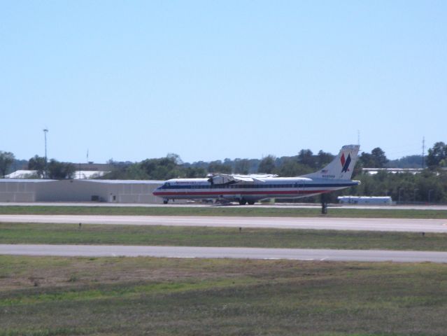 N540AM — - American Eagle flight landing during the Fort Smith Airshow