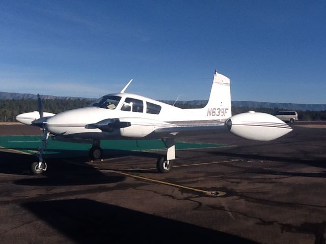 Cessna 310 (N639F) - Payson ramp and mogollon rim behind.