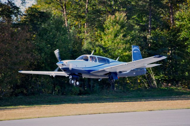 Mooney M-20 (N930MR) - N930MR departs runway 19 at Hickory Regional Airport