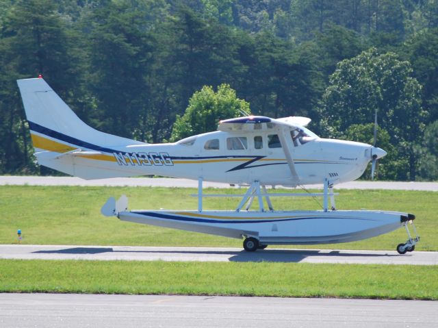 Cessna 206 Stationair (N113GG) - JAG FLIGHT SERVICES INC taxiing to runway 2 at KJQF - 6/27/12