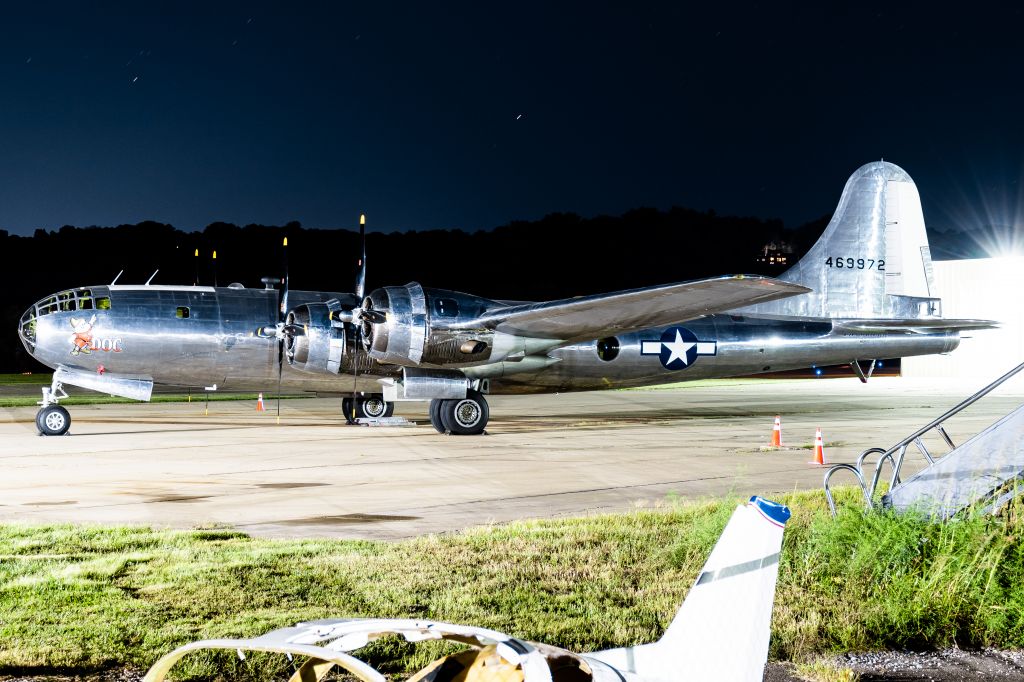 Boeing B-29 Superfortress (N69972) - Doc resting after a day of flying passengers around the Cinci/NKY area! The airplane carcass in the foreground is a good example of what Doc could be had she not been rescued and restored to perfect condition!