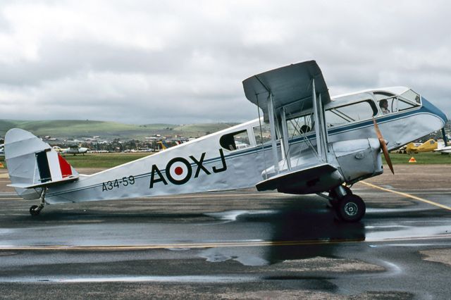 De Havilland Canada Twin Otter (VH-AQU) - DE HAVILLAND DH-84 DRAGON - REG : VH-AQU (CN DHA2048) - PARAFIELD AIRPORT ADELAIDE SA. AUSTRALIA - YPPF 27/9/1982
