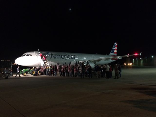 Airbus A321 (N923US) - American Airlines A321 on the ramp outside of Niswonger Aviation Technology building at the Purdue University Airport after completing the final Honor Flight for 2015. 