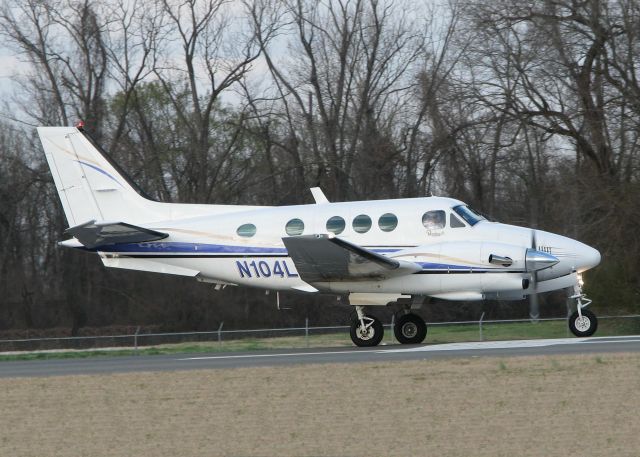 Beechcraft King Air 90 (N104LC) - Starting to roll down runway 14 for take off at the Shreveport Downtown airport.