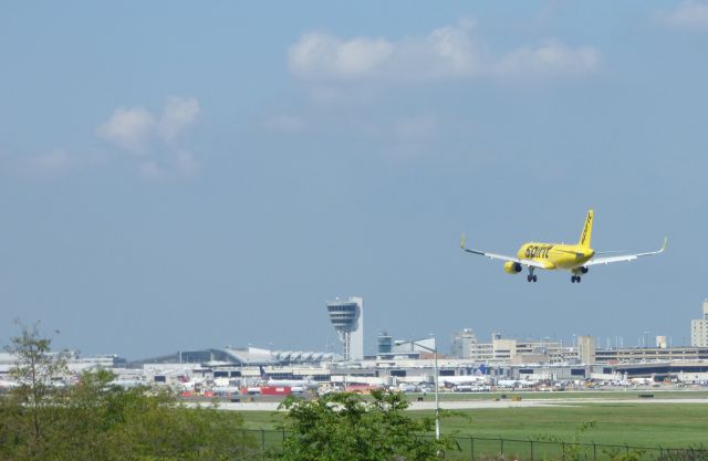 Airbus A320 (N645NK) - The Philly Control Tower with a 2016 Spirit A320 Airbus about to touchdown in the Summer of 2016.